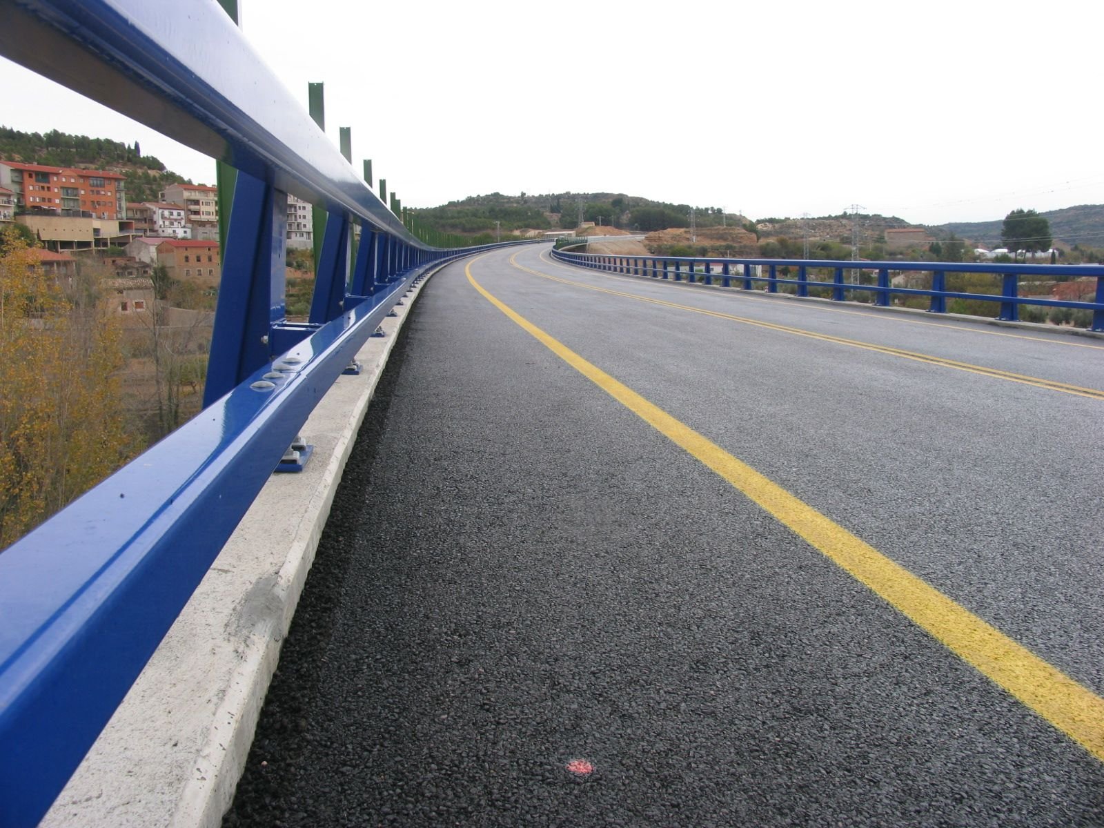 Rail and bolted base plates