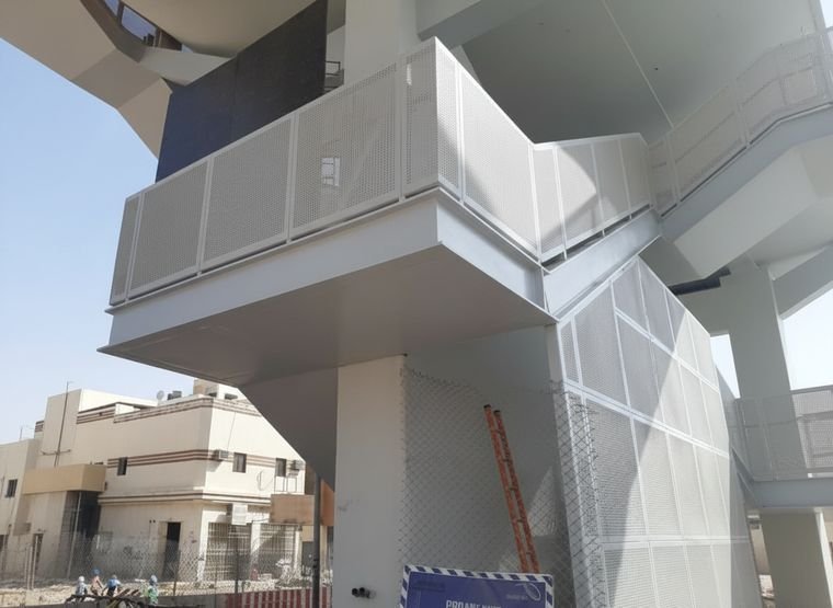 Perforated cladding on a building core